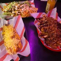 Supreme nachos, cheesr bacon hot dog and dirty chicken fries at Hank's  Dirty Colchester in Colchester