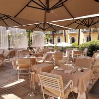 Outdoor seating at Le Relais by Villa Castagnola in Lugano