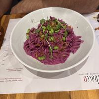 Whole wheat pasta with beet pesto and fried onions    at Perbacco in Locarno