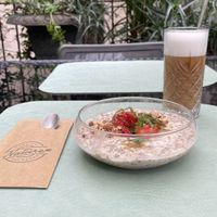 Overnight breakfast bowl - strawberry and latte macchiato with oat milk at Caffè dell'Arte Boutique Rooms in Locarno