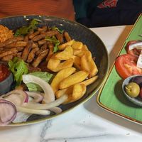 Tomaten-Carpaccio mit veganem Feta und veganes Gyros  at Kytaro in Hannover