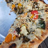The Health Nut pizza with vegan cheese at Coastal Crust in Mount Pleasant