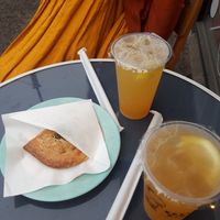 Vegan empanada, passion fruit and peach flavored boba drinks at Boba Bao in Helsinki