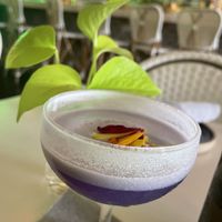 Spice mocktail (like a pina colada) separated into pretty layers    at Mood in Tequesta