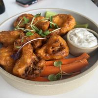 Buffalo cauliflower bites with blue cheese sauce   at Mood in Tequesta
