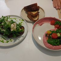 Hummus salad, mushroom tartine, and sourdough at Pinch Brunch Bar in Seoul
