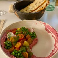 Beetroot hummus & added sourdough bread slices on Valentine’s day in 2025. The bread used to be much thicker. The plating of dish seems to be changed from time to time.   at Pinch Brunch Bar in Seoul