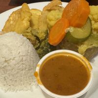 Veggie stuffed mofongo (smashed plantain) with rice and beans and tostones de pana.  at Café El Punto in San Juan