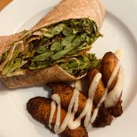 Veggie wrap and maduros with garlic sauce  at Mojito Cafe in Virginia Beach
