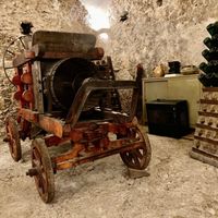 Old winery equipment in the main dining room at Le Cannardizie in Atina