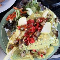 Baked potato with vegetable and a curry saus  at Foodline in Torrevieja