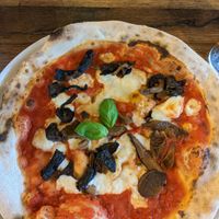 Vegan mushroom pizza at Cheese and Tomatin in Aviemore