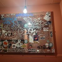 Bathroom graffiti mirrors at Comet Ping Pong in Washington