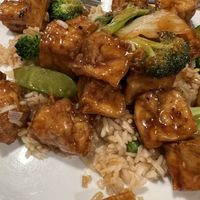 General tsaos bean curd with veggie fried rice  at Eat Rice in Kettering