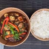«Vegan hallucination» — 3 types of mushrooms and tofu in Thai mushroom sauce with veggies and spices, serves with rice  at Guerrilla Kitchen  in Ramat Gan