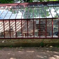 The Orangerie, a lovely inside seating area to enjoy your coffee and sweets (or a nice sandwich) at Ulriksdals Trädgård Arts & Crafts in Kivik