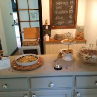 Café from the inside with some prices on the board. at Ulriksdals Trädgård Arts & Crafts in Kivik