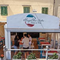 Outside seating at MagnEtico Bistrò in Porto Azzurro