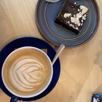 oat latte and vegan cookies and cream brownie!   at Coffee on The Crescent in Leeds