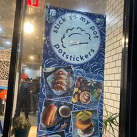 Window sign at Stick To My Pot in New York City