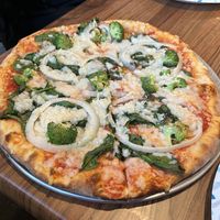 Topped with broccoli, spinach, and white onions  at Amazing Pizza and More in Salem