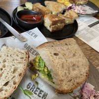 Coronation chickpea sourdough sandwich, children’s vegan cheese toasties and caramelised onion chutney and vegan cheese toastie    at Little Green Refills in Abergavenny