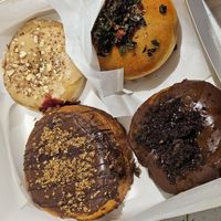 Kinder Bueno, PB&jelly, mocha and spicy cream cheese. at Delish Vegan Doughnuts - Malasaña in Madrid