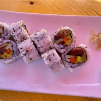 Veggie roll
 (it looks red because I was under a red umbrella)  at Raku in Washington