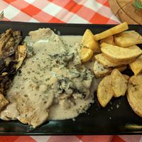 Huhn mit Pilzsoße at Vegitalian in Salzburg