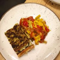 Savory pie with almond ricotta and a side of peppers with onions at Idem Con Patate in Turin