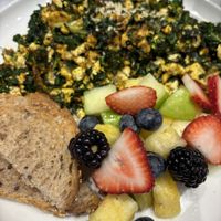 Green tofu scramble with multigrain toast and fruit   at Spring Cafe Aspen in New York City