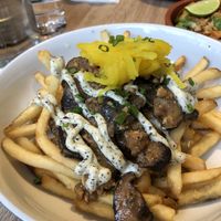 Truffle fries - love the pairing with braised mushrooms and tempeh and pickled daikon!! at Little Bao Diner in Hong Kong Island
