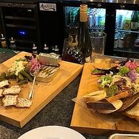 service lends toward sharing at Hollerhorn Distilling in Naples