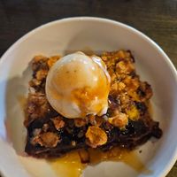 Concord grape crumble with vegan vanilla ice cream at Hollerhorn Distilling in Naples