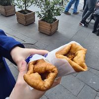 Left (scovergă with garlic sauce/mujkei). Right (scovergă with cooked cabbage) at Scovergi Mica in Bucharest