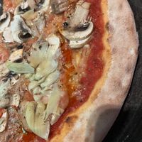 Mushrooms and artichoke with vegan cheese  at Pizzeria Giuseppe in Zell Am See