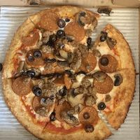 Build Your Own Vegan Pizza with vegan cheese, vegan sausage, and vegan pepperoni at University Pizza Company in Riverside