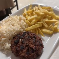 Beyond meat burger with fries and rice  at Lurdes Capela in Geres