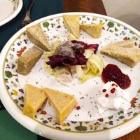 10.2023 - 'Winter' starter: plate of vegan cheeses at Le Fate in Florence
