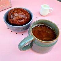 Caffè americano e brioche Black Panther 🌱 at Nowhere in Milan