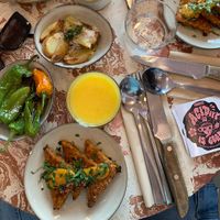 corn fritters 🌽 , pimientos de padròn  at Nowhere in Milan