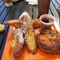Vegan french toast & sweet potato hash w/ maple syrup, powdered sugar & earth balance on color-coded plates for veg*n dishes! Tasty soy cafe mocha. at Scramble in Phoenix