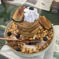 peanut butter pancakes with chai granola  at Kappra Cafe in Bangkok