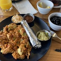 “Vigas” with cheese on the side (usually comes on it) with several salsas - red is spicy but was yummy!  at Seven Mile Cafe in Lewisville