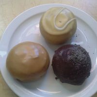 salted caramel, orangesicle, and chocolate cookie donuts at Pepples Donut Farm in Berkeley