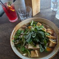 Pho with hibiscus tea in the background at Vegang in Berlin