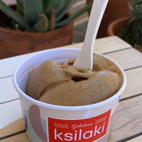 Vegan Cappuccino ice cream. Size medium (two scoops in the bowl). 
Unfortunately, they don’t offer vegan cones.   at Gelateria Ksilaki in Nikitas