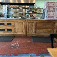 Nice inside with a/c and great music.  at Zazzy's Pizza - Upper East Side in New York City