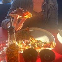 12” pizza with green olives, red onions, garlic, red pepper flakes, and vegan cheese.  at The Blue Zone in Dingle