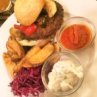 Great vegan tempeh burger! at Mlsna Kavka in Prague